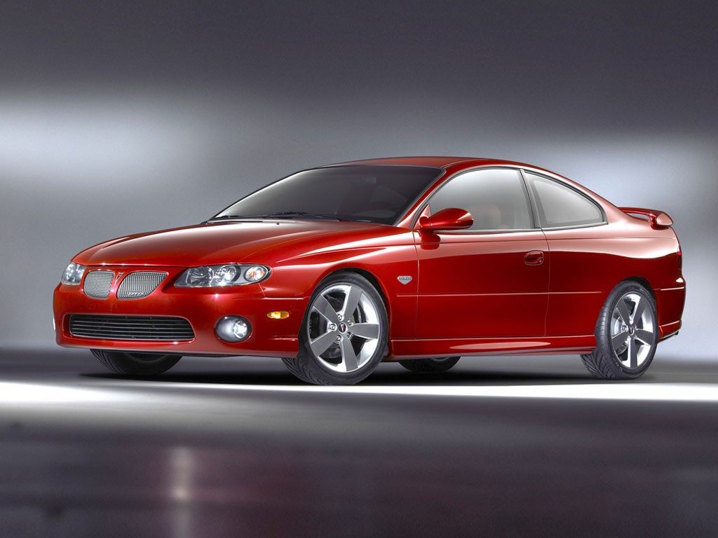 2006 Pontiac GTO red studio image front three quarter shot