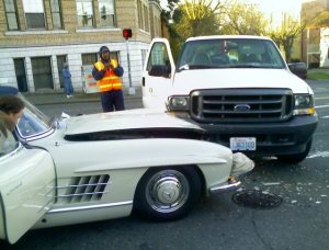Mercedes Benz SL 300 Gullwing crashed into a ford super duty truck