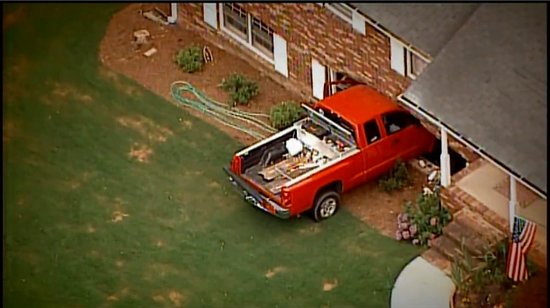 Truck Crashes Into House