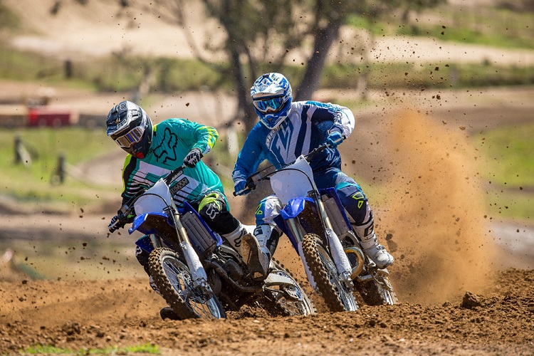 Two Riders Racing Off Road
