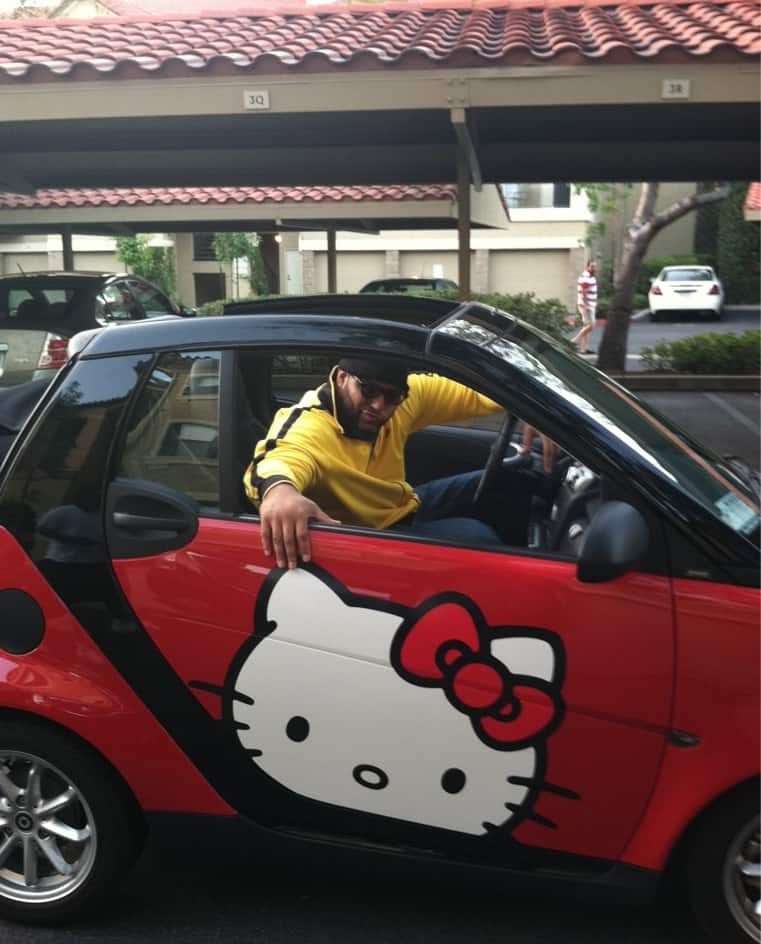 Antonio Garay and his 2008 Smart ForTwo Hello Kitty edition